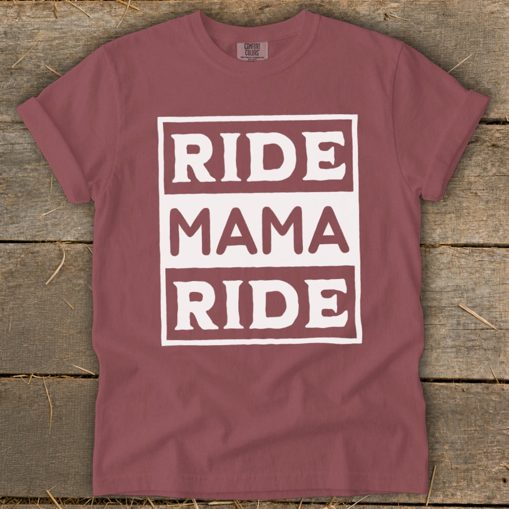 Burgundy Comfort Colors t-shirt with white "RIDE MAMA RIDE" graphic.