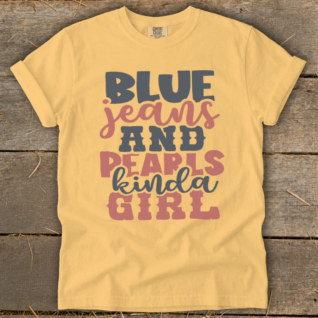 Yellow t-shirt with "BLUE JEANS AND PEARLS kinda GIRL" graphic text.