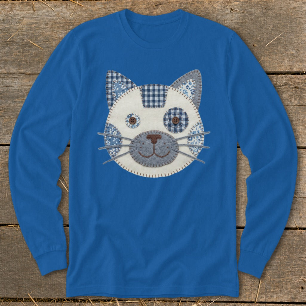 Blue long-sleeve shirt with a patchwork cat face applique.