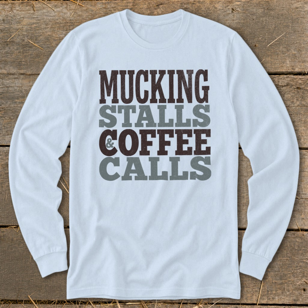 Light blue long-sleeve shirt with "Mucking Stalls & Coffee Calls" text.