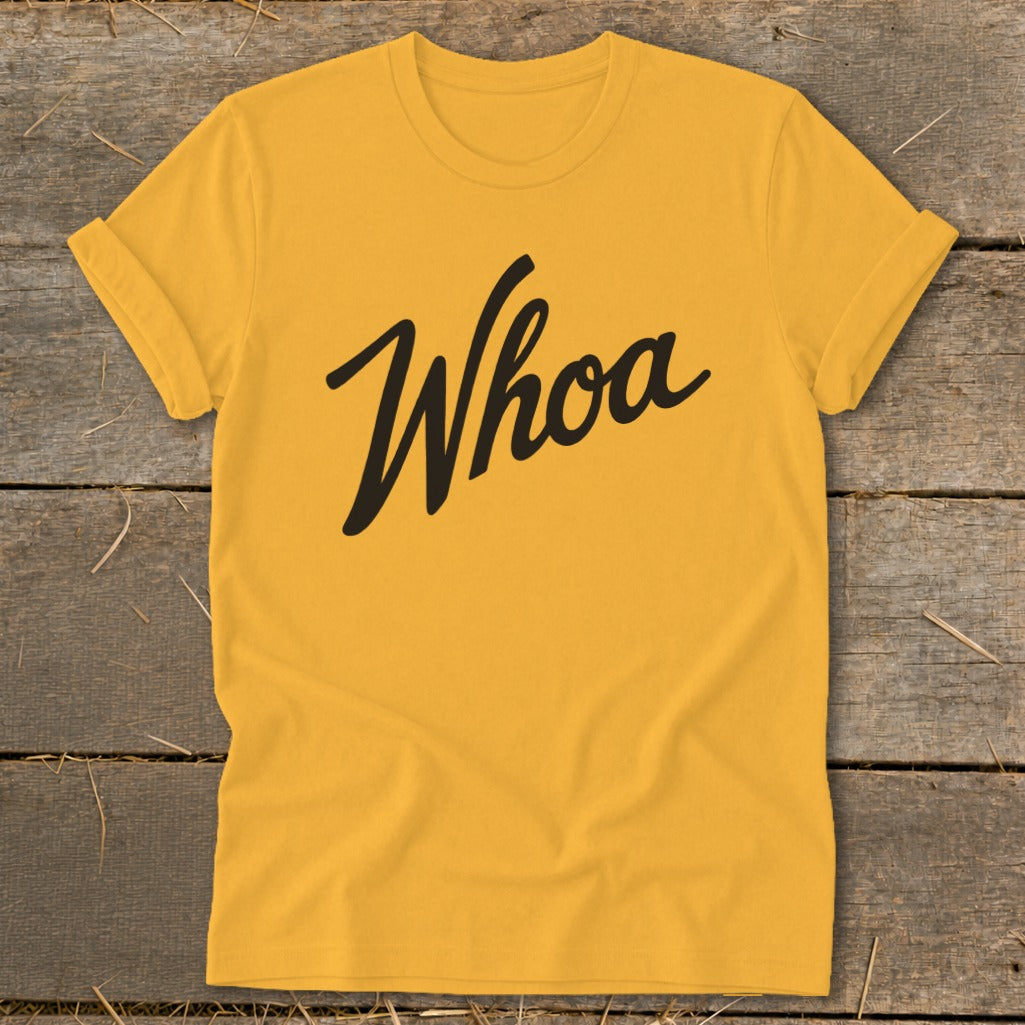 Yellow t-shirt with "Whoa" in black cursive text.