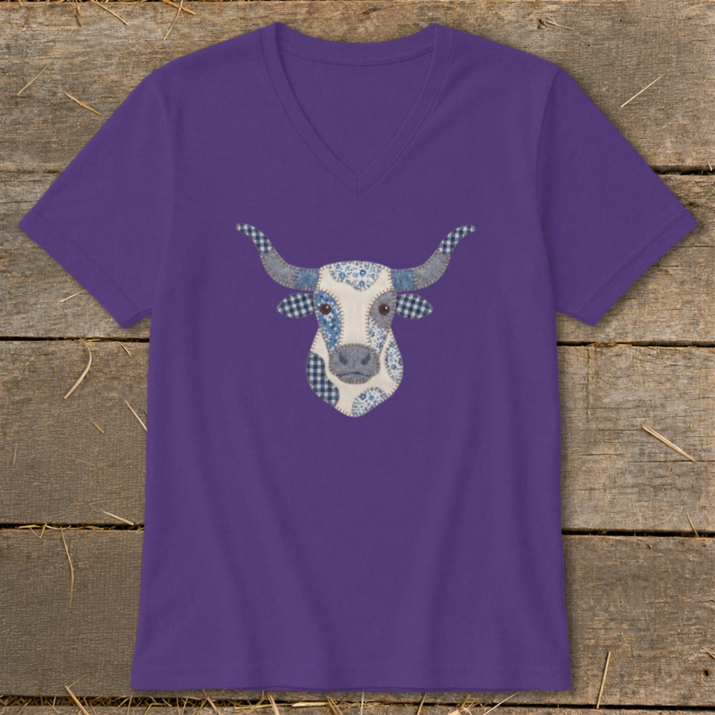 Purple v-neck t-shirt with a patchwork bull's head graphic.