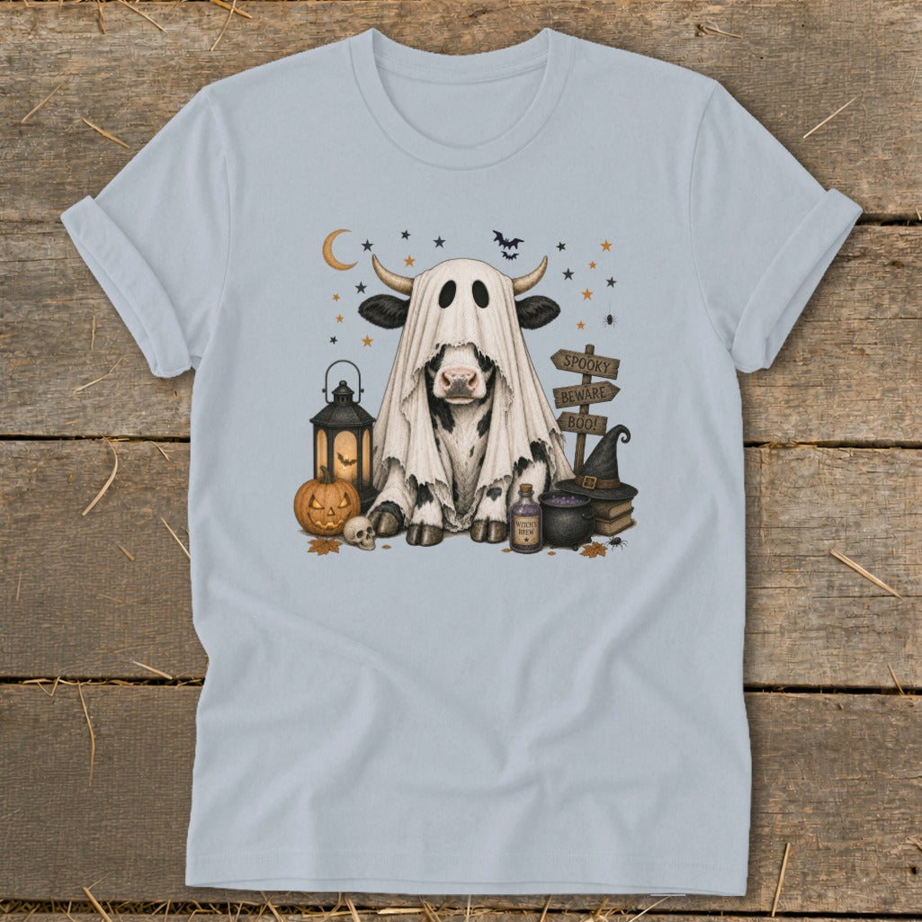 Cow dressed as a ghost with Halloween decorations and "Spooky Beware Boo!" signs.