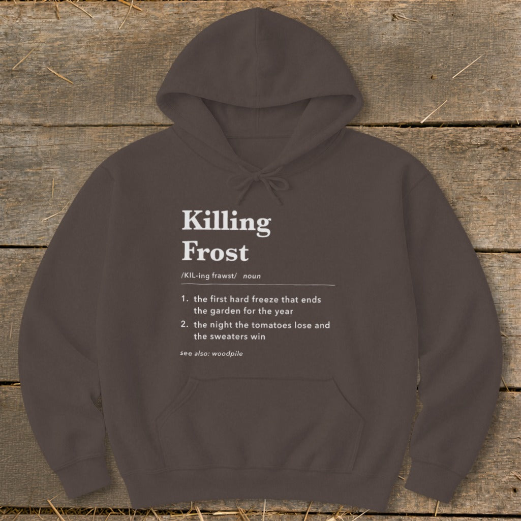 Dark brown hooded sweatshirt with white dictionary-style text defining Killing Frost displayed centrally on the chest.