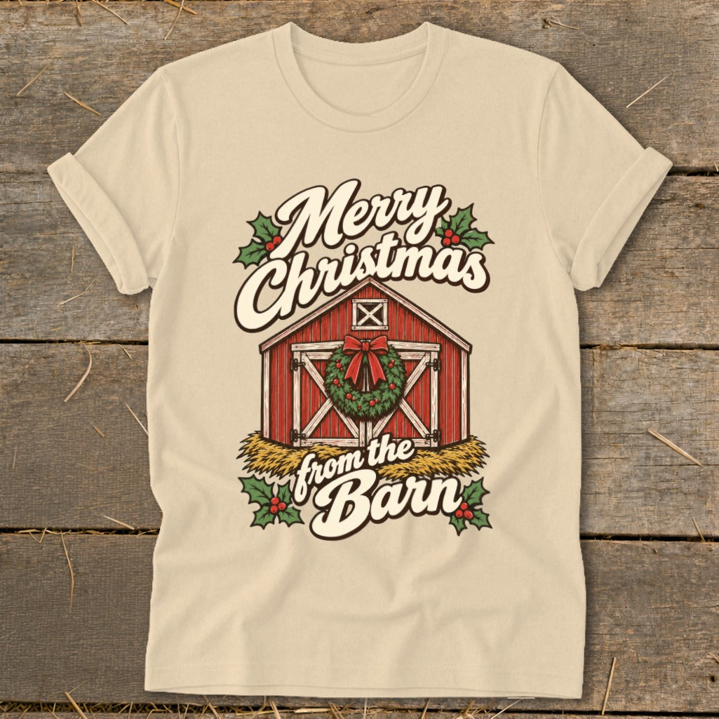 Light tan t-shirt with "Merry Christmas from the Barn" and a red barn with wreath.