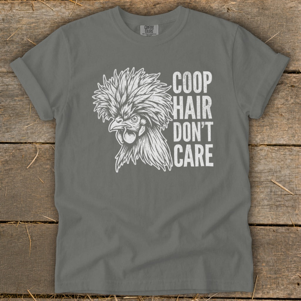 Gray t-shirt with white illustration of a fluffy chicken and text "COOP HAIR DON'T CARE".