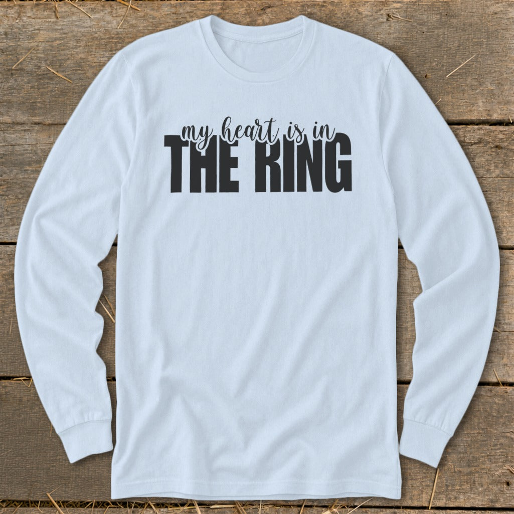 Light blue long-sleeve shirt with black text "my heart is in THE RING".
