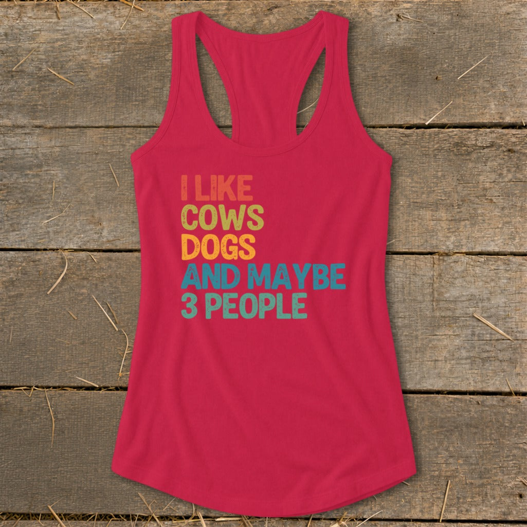 Pink tank top with "I like cows dogs and maybe 3 people" text.