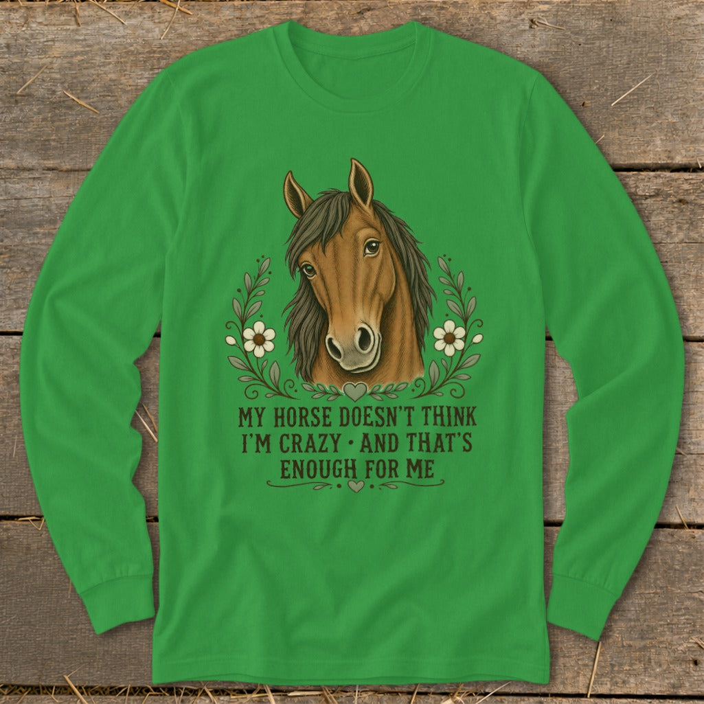 Green long-sleeve shirt with horse graphic and text "My horse doesn't think I'm crazy and that's enough for me."