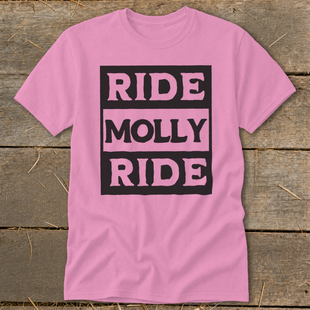 A pink t-shirt featuring a black box on the chest with the text "RIDE MOLLY RIDE" in pink lettering.