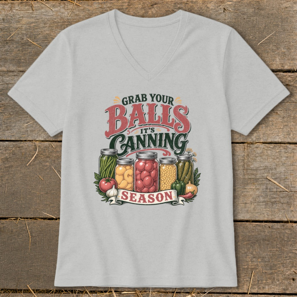 Graphic tee with text "Grab Your Balls It's Canning Season" and jars of produce.