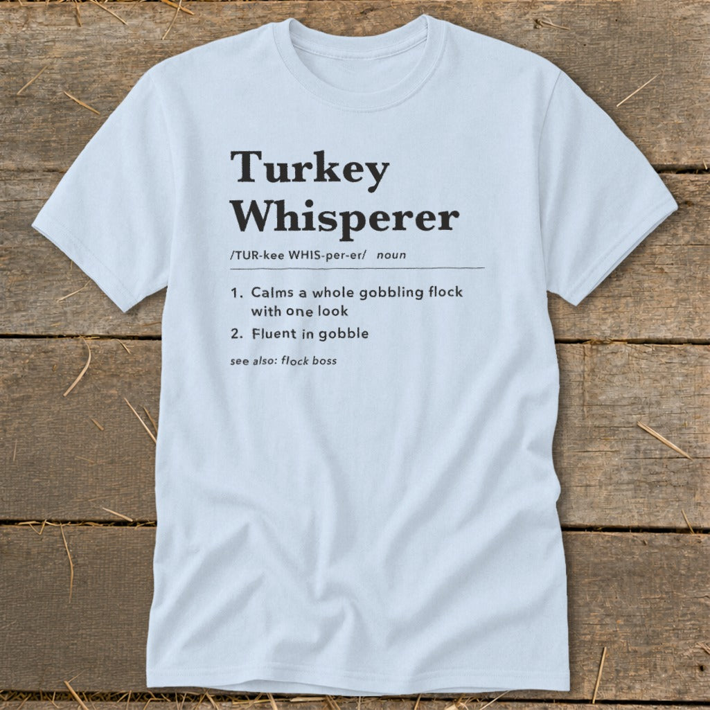 Light blue t-shirt with "Turkey Whisperer" definition and related phrases.