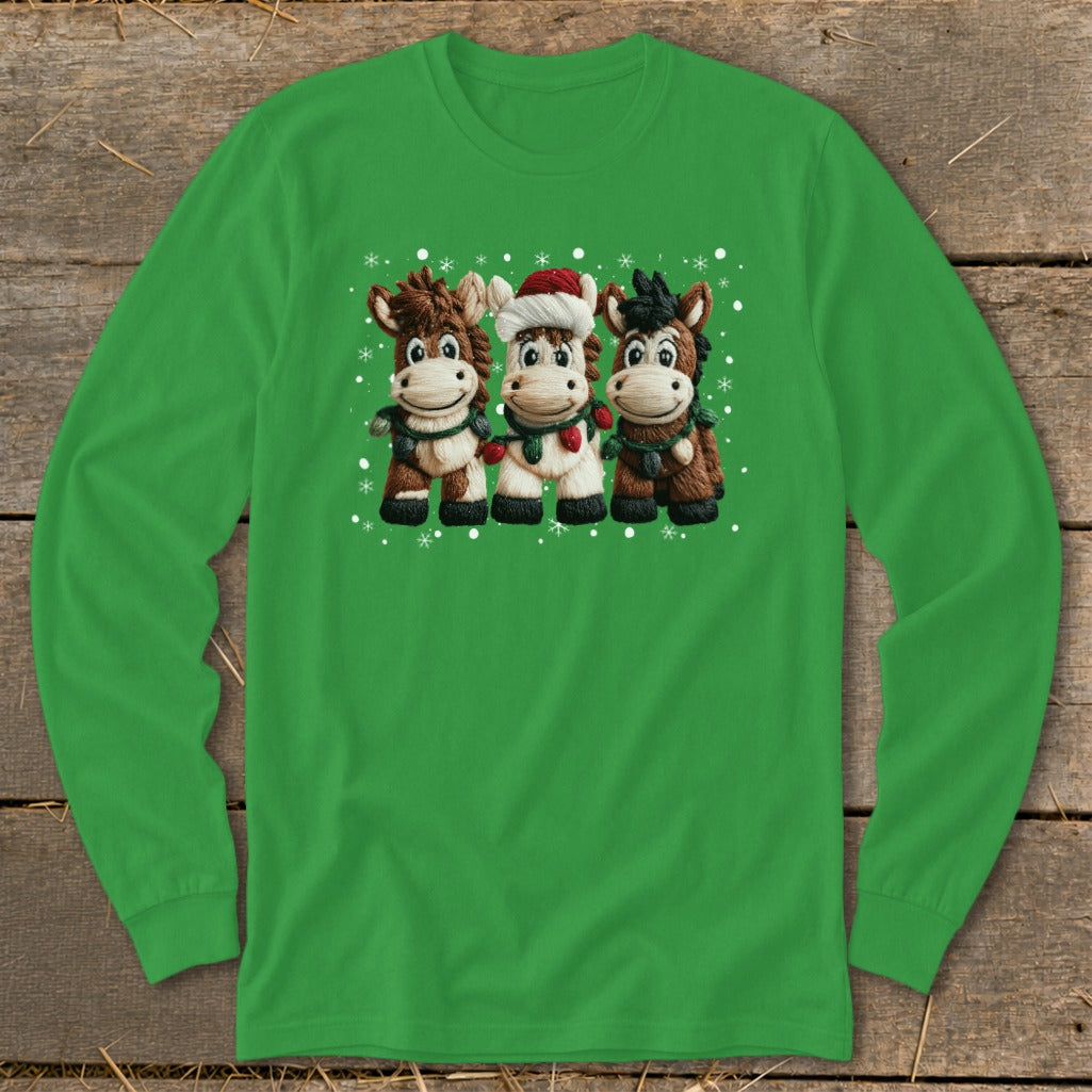 Three cartoon horses wearing Christmas scarves and one with a Santa hat, surrounded by snowflakes.