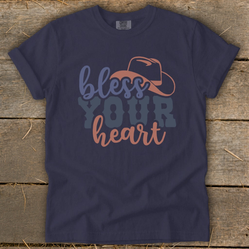 Navy t-shirt with "bless YOUR heart" graphic and a cowboy hat.