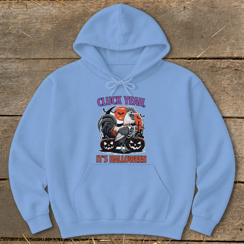 Light blue hoodie with a skeleton rooster, pumpkins, and text "CLUCK YEAH, IT'S HALLOWEEN".