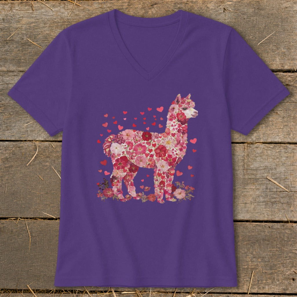Purple t-shirt with a floral alpaca design and scattered hearts.
