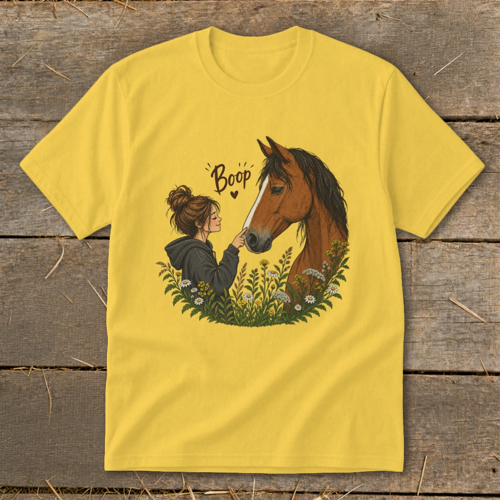 Illustration of girl touching horse's nose with text "Boop" and heart.