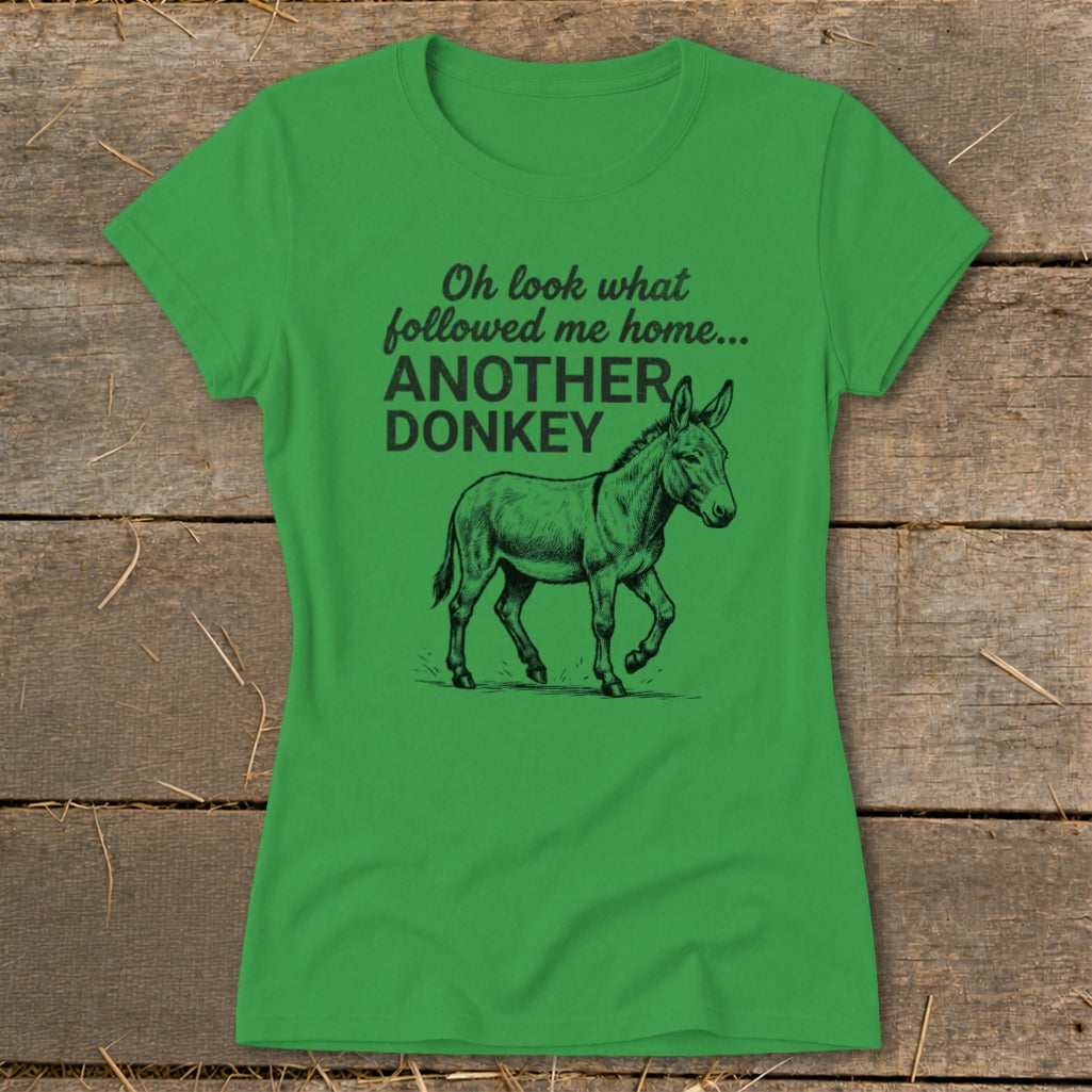 Green t-shirt with text "Oh look what followed me home... ANOTHER DONKEY" and a donkey graphic.