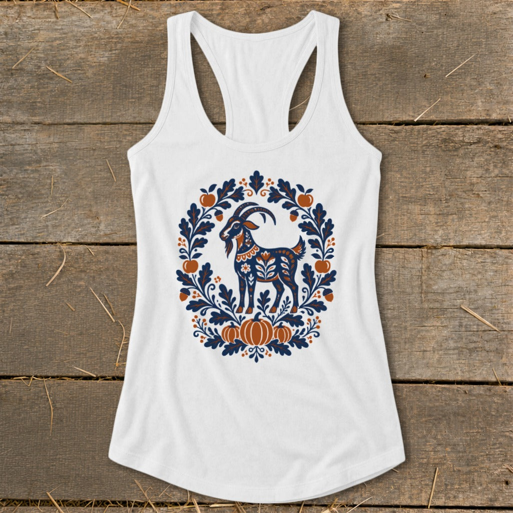 White racerback tank top featuring a folk art goat graphic surrounded by an autumn wreath.