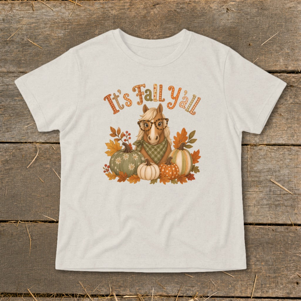 Graphic on t-shirt with horse, pumpkins, and "It's Fall Y'all" text.