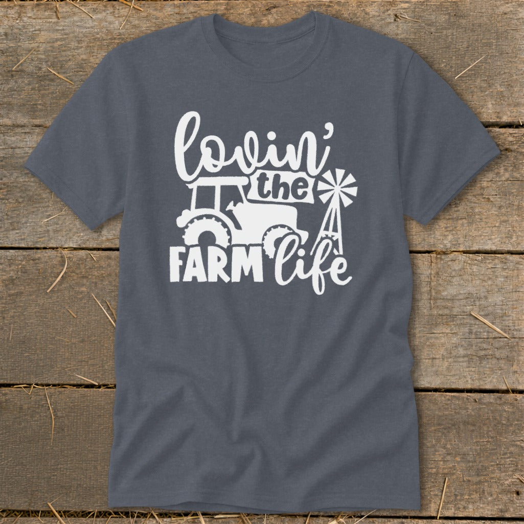 Gray t-shirt with white graphic of a tractor and windmill, reads "lovin' the FARM life".