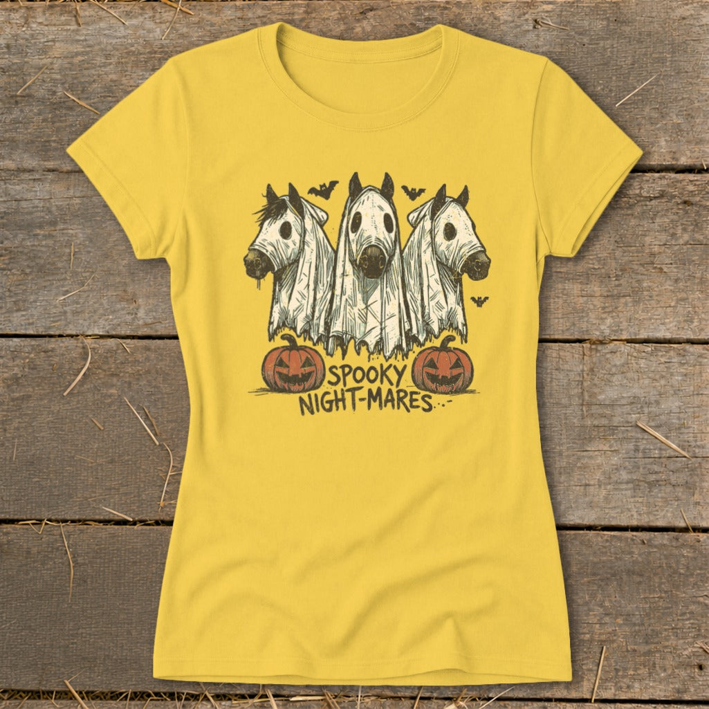 Three horses dressed as ghosts with pumpkins and bats, reading "Spooky Night-Mares".