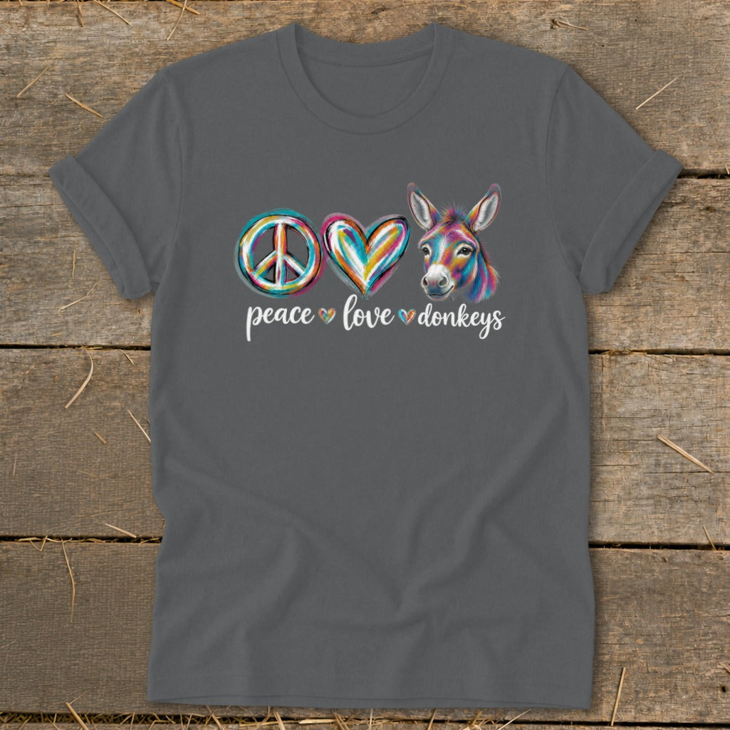 Gray t-shirt with peace sign, colorful heart, and donkey graphic with text.