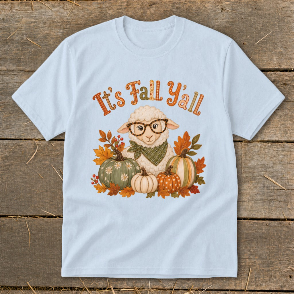 Light blue t-shirt with sheep, pumpkins, and "It's Fall Y'all" text.