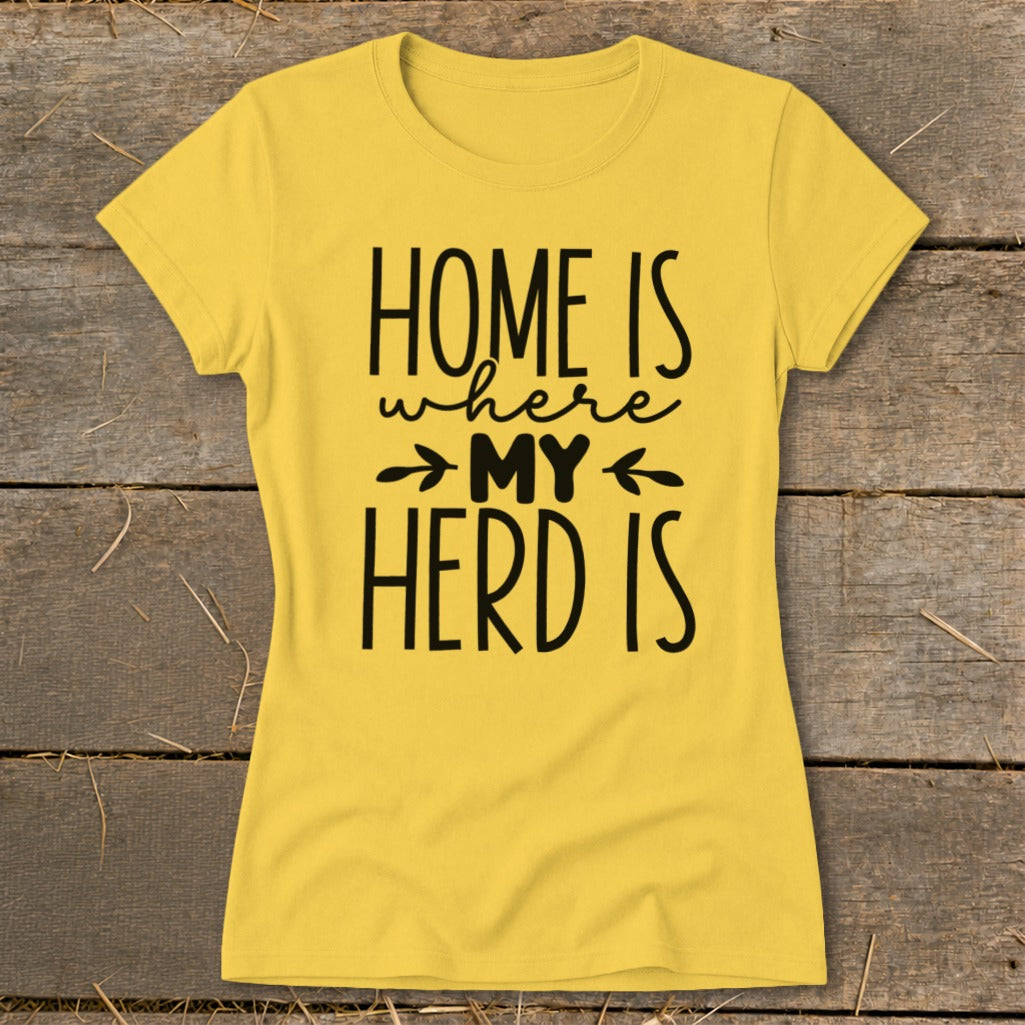 Yellow t-shirt with black text that reads "HOME IS where MY HERD IS".
