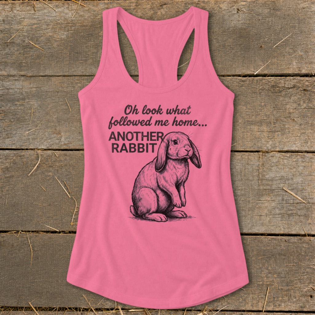Pink tank top with rabbit drawing and text "Oh look what followed me home... ANOTHER RABBIT".