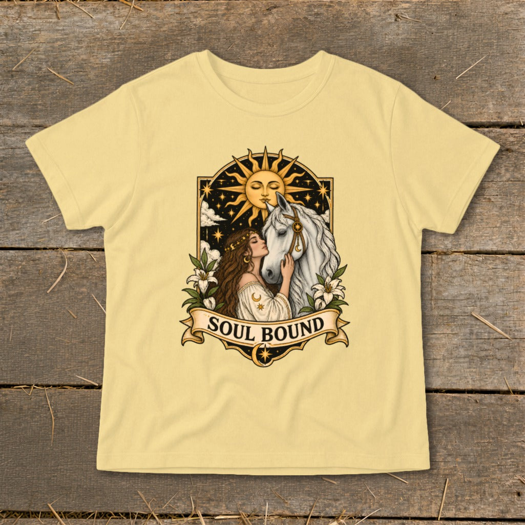 Woman embracing white horse under sun and stars with text "SOUL BOUND."