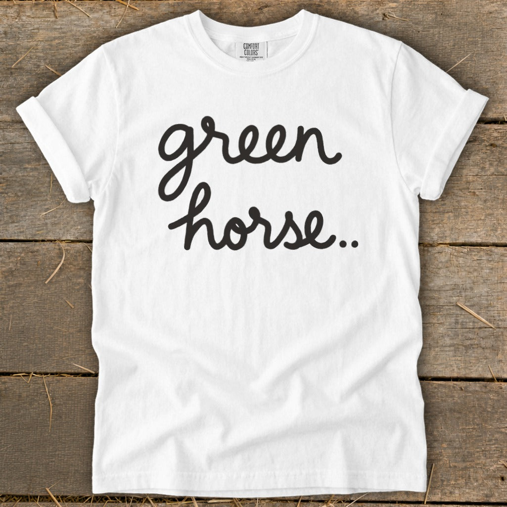 White t-shirt with black cursive text "green horse..".