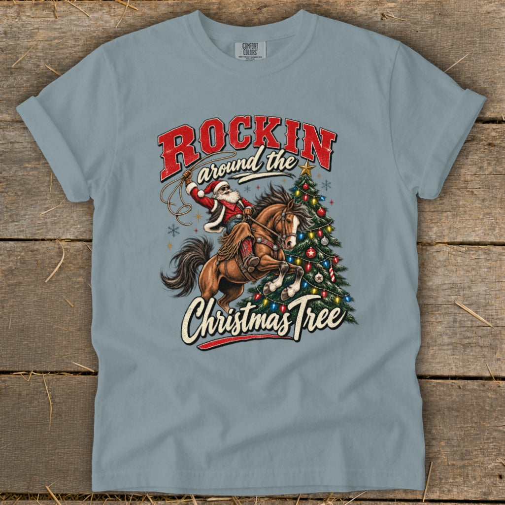 Santa on horseback swings a lasso around a Christmas tree with text "Rockin Around the Christmas Tree".