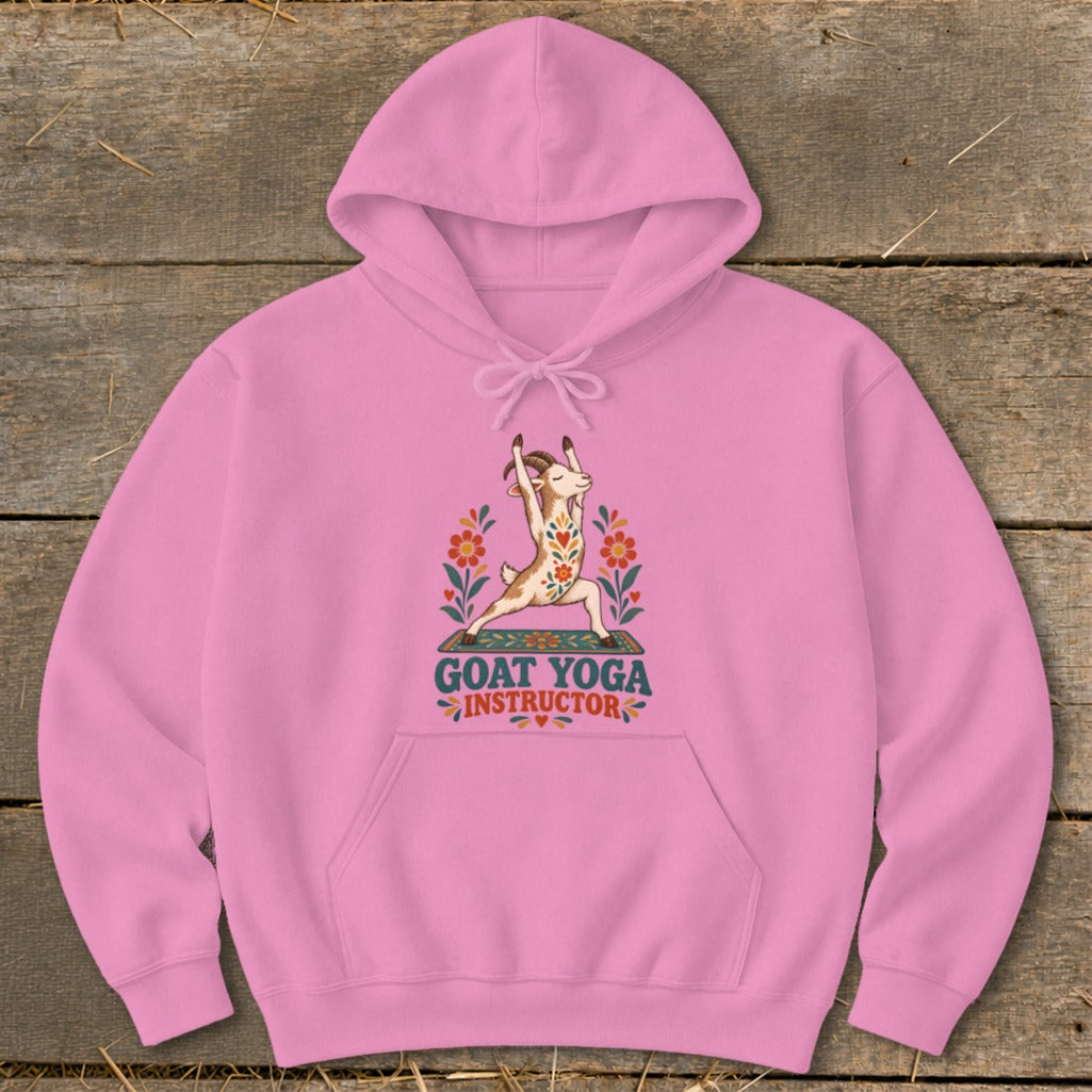 Pink hoodie with a goat doing yoga and text "GOAT YOGA INSTRUCTOR".