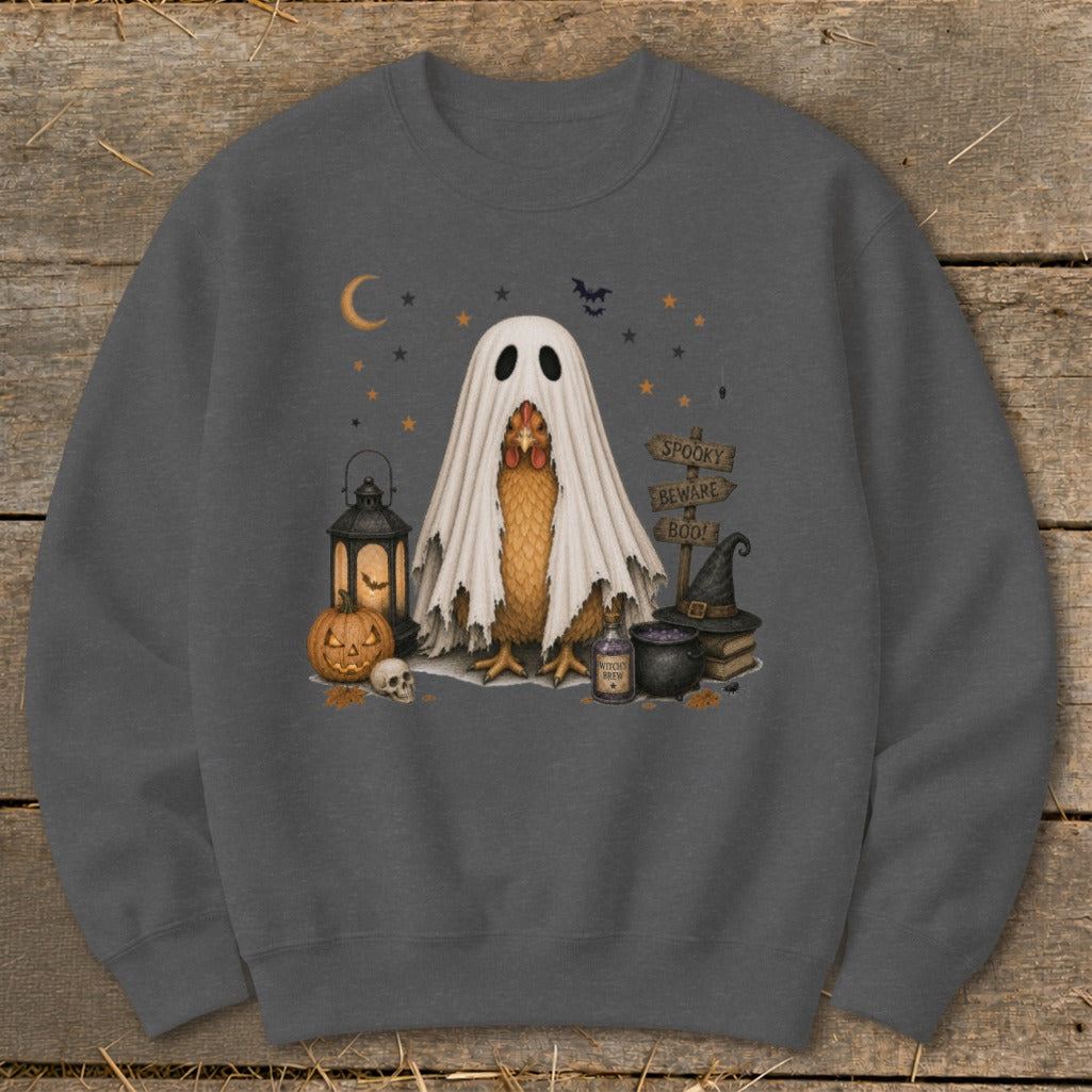 Chicken in ghost costume with Halloween decorations and "Spooky Beware Boo!" sign.