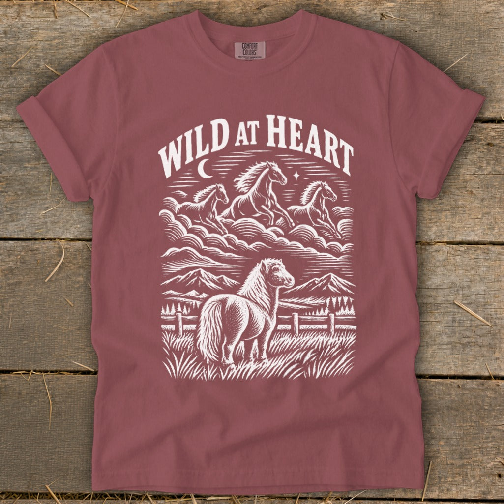 "Wild at Heart" text above a sketch of horses in clouds and a pony in a field.