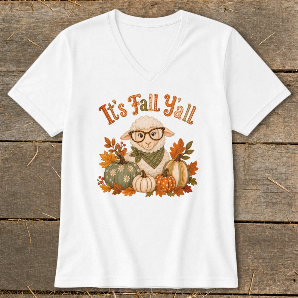 White v-neck t-shirt with a sheep wearing glasses and pumpkins, featuring "It's Fall Y'all" text.