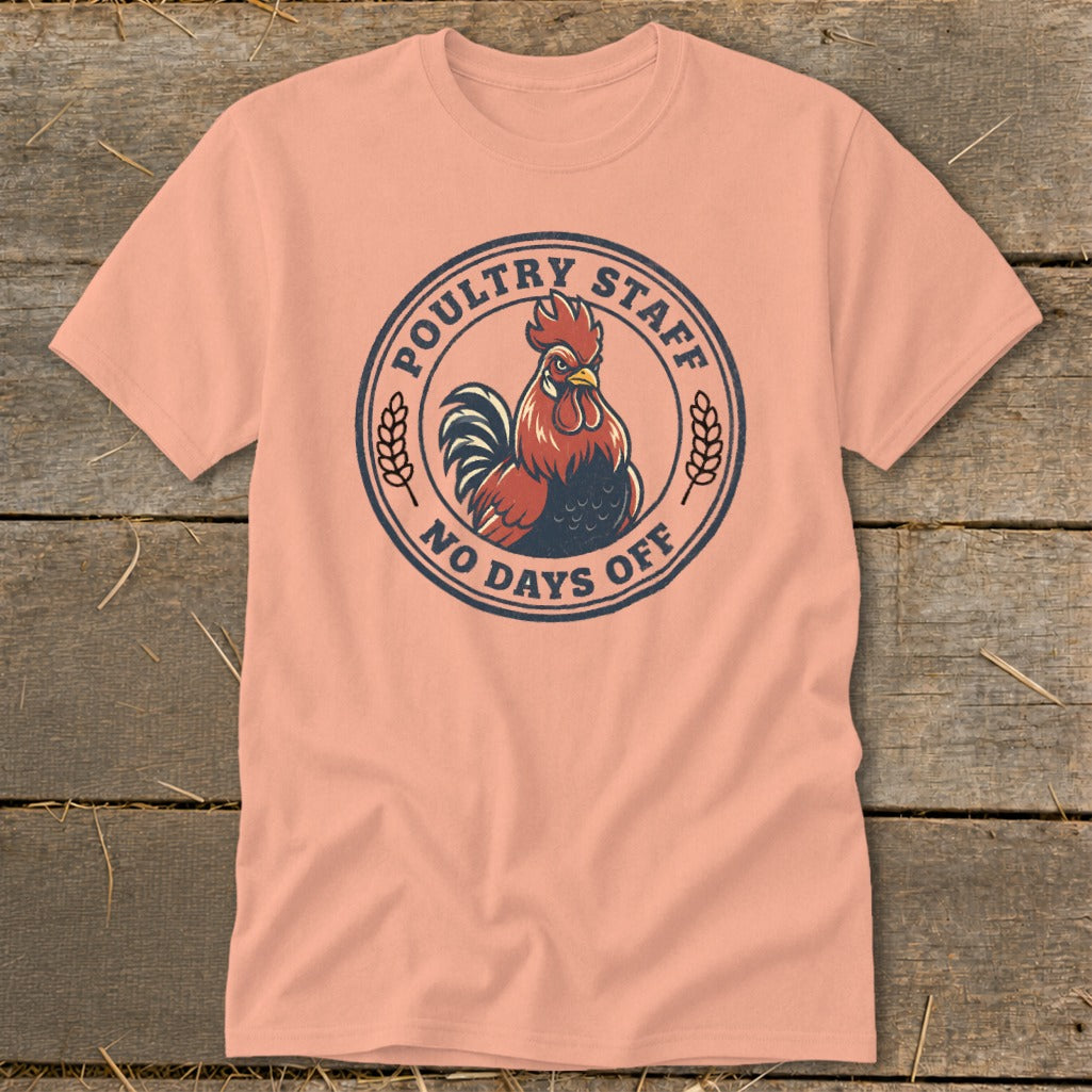 Peach t-shirt with a circular graphic featuring a rooster and the text "Poultry Staff No Days Off."