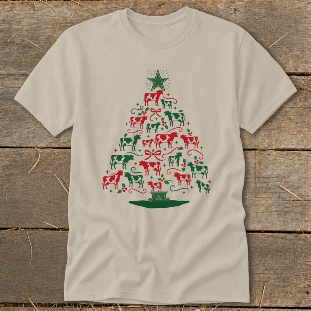 T-shirt with a Christmas tree made of red and green cows and festive accents.