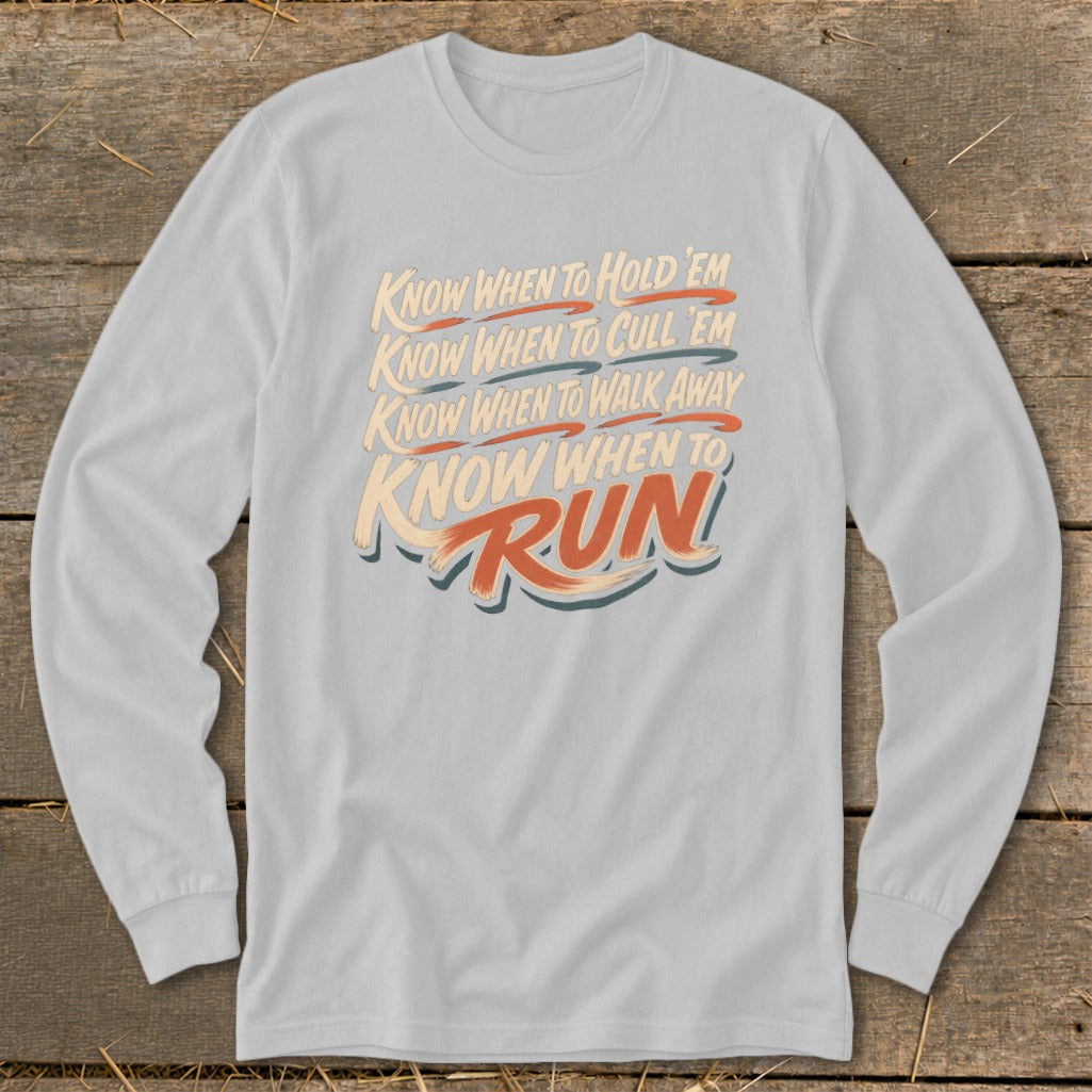 Light gray long sleeve shirt with text "Know When to Hold 'Em, Cull 'Em, Walk Away, Run".