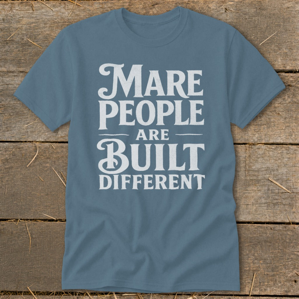 Blue t-shirt with white text: "Mare people are built different."
