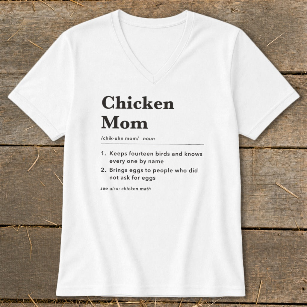 White v-neck t-shirt with "Chicken Mom" definition printed on it.