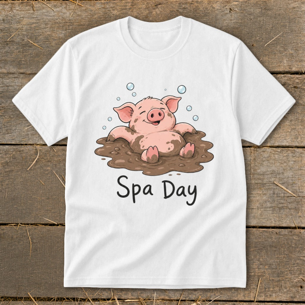 White t-shirt with cartoon pig in mud, text "Spa Day"