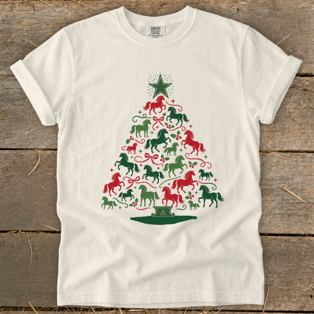 White t-shirt with Christmas tree design made of red and green horses.