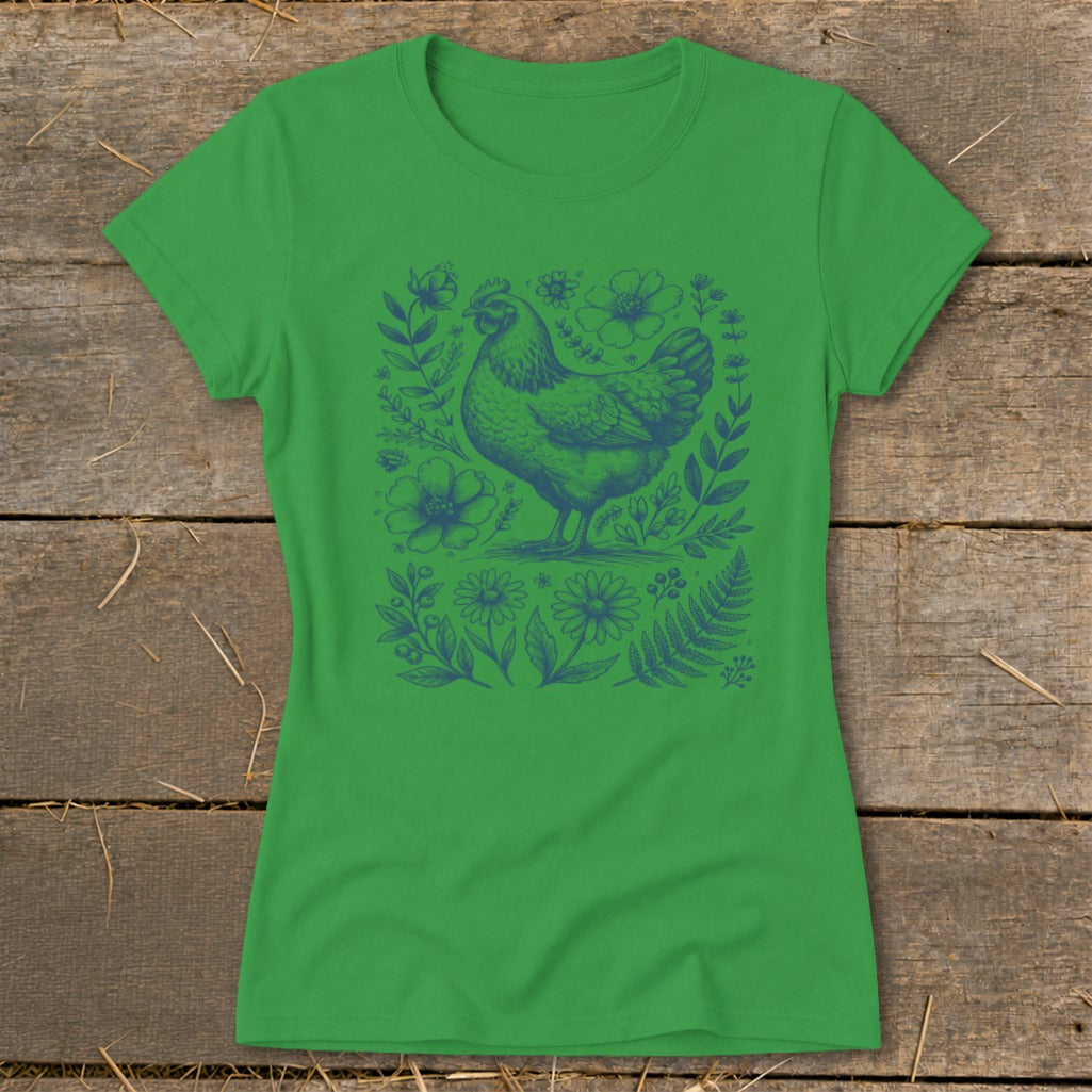 Green t-shirt with a blue chicken and floral design.