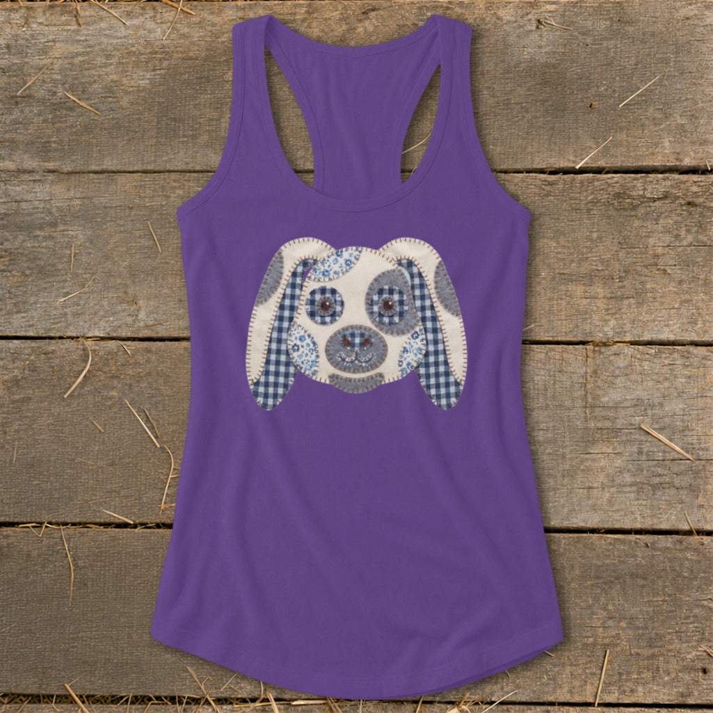 Purple tank top with a stitched dog face appliqué on the front.