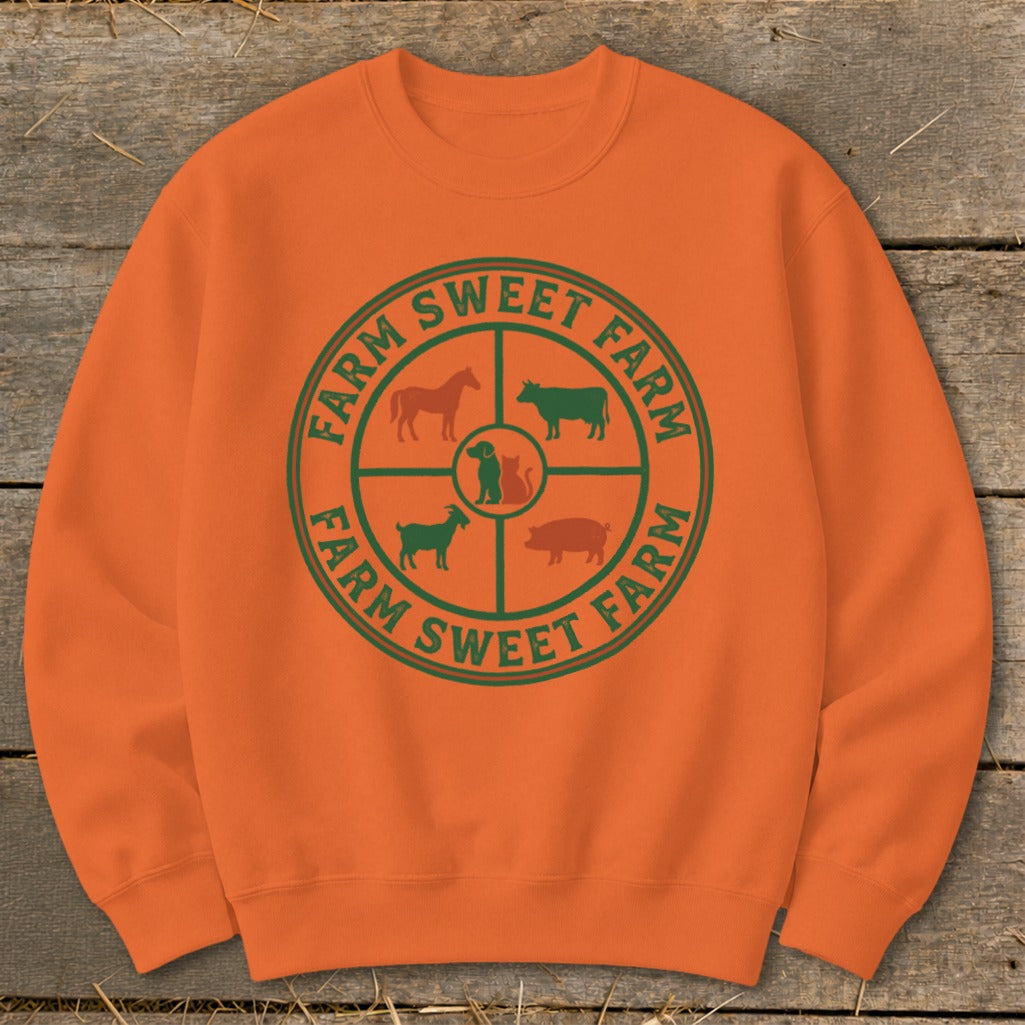 Orange sweatshirt with a green circular farm animal graphic and text.
