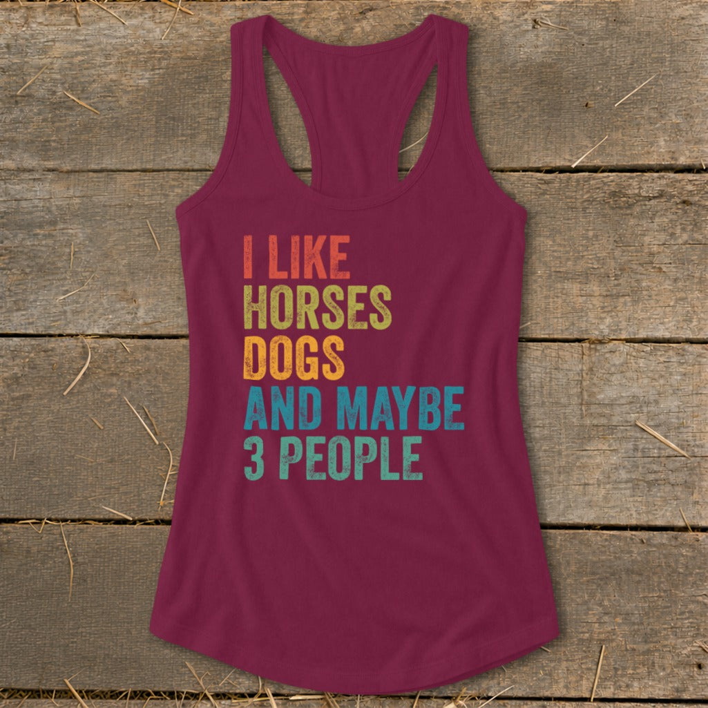 Burgundy tank top with text "I LIKE HORSES DOGS AND MAYBE 3 PEOPLE".