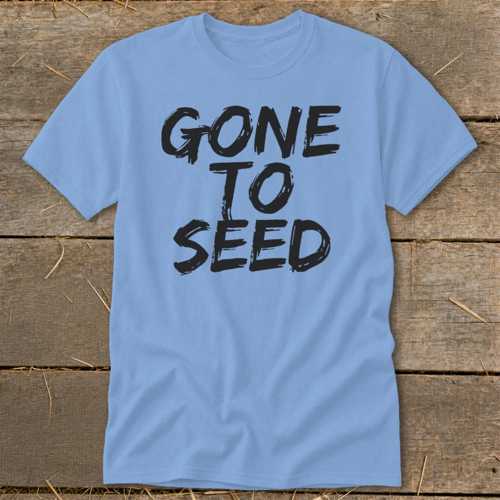 Light blue t-shirt with black distressed text that reads "GONE TO SEED".