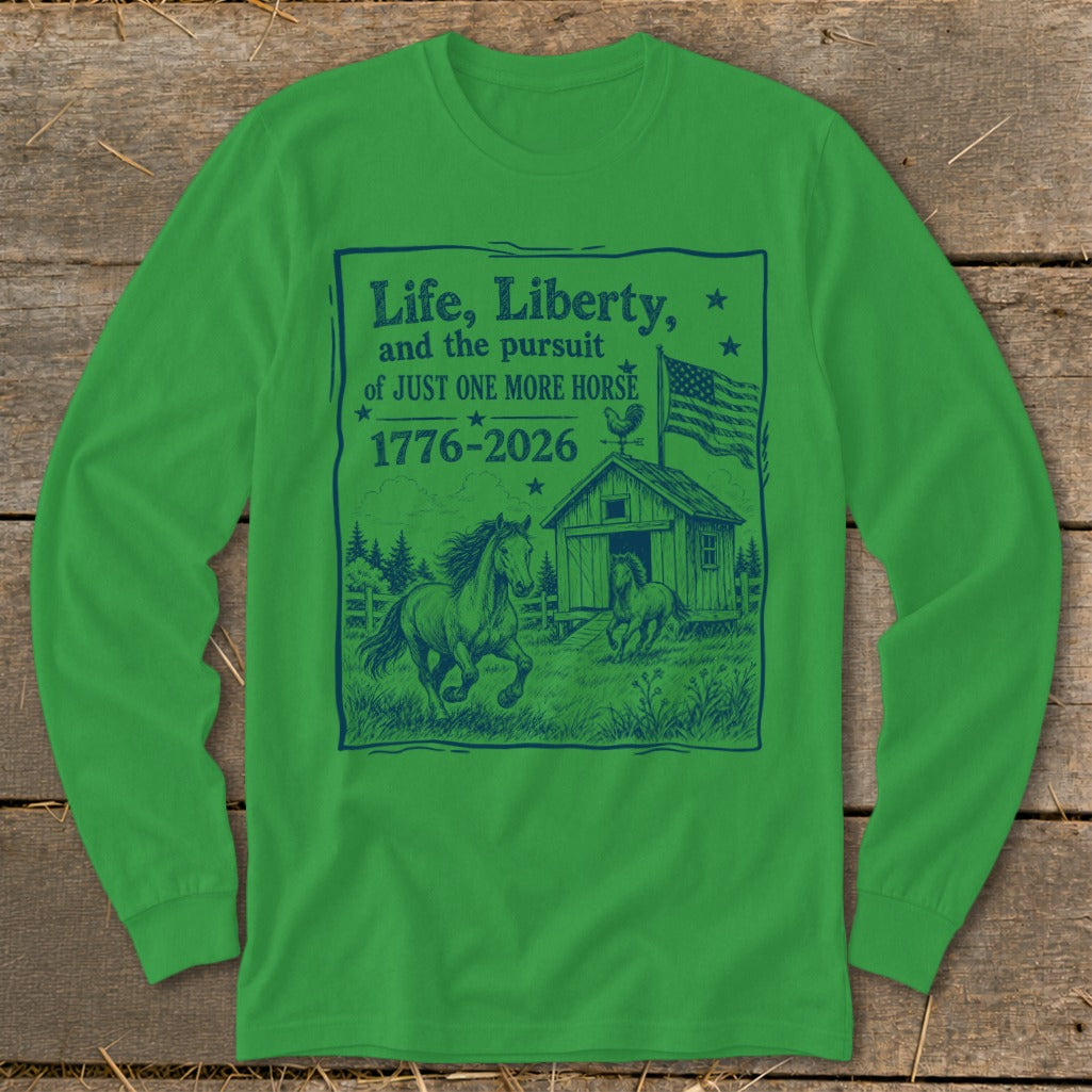 Green long sleeve shirt with blue graphic featuring horses, barn, American flag, and text.